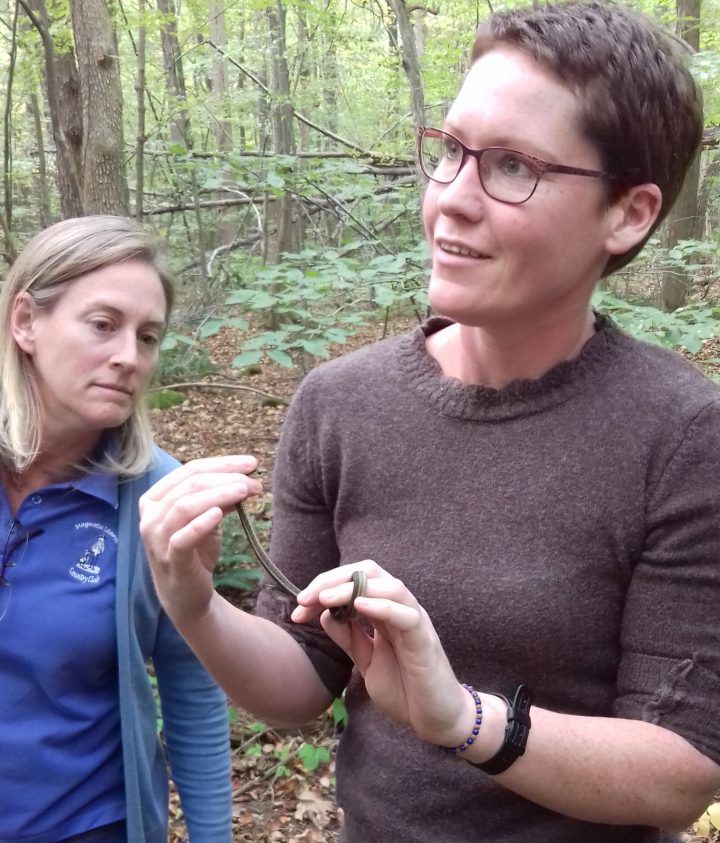 Guest blogger Deb Bower (holding garter snake in Sapsucker Woods) and fellow Australian scientist Sheryn Brodie take a break from staring at sound spectrograms during the recent Sound Analysis Workshop.