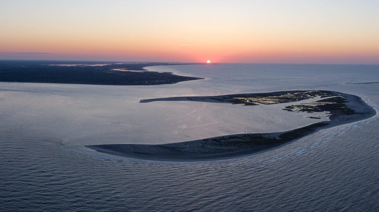 The sun rises over Deveaux Bank, at the mouth of the North Edisto River
