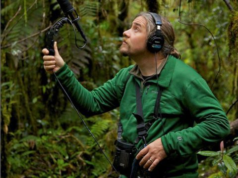 Scientist Ed Scholes recording sound in West Papua.