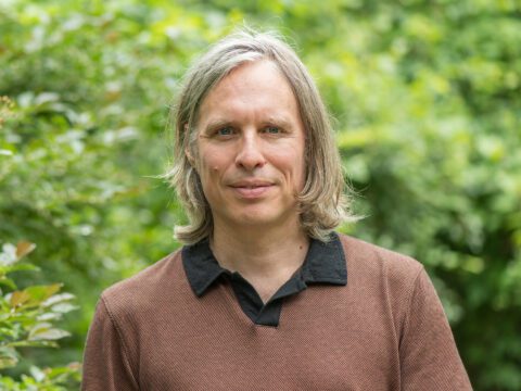 Adriaan Dokter posing in front of the camera.