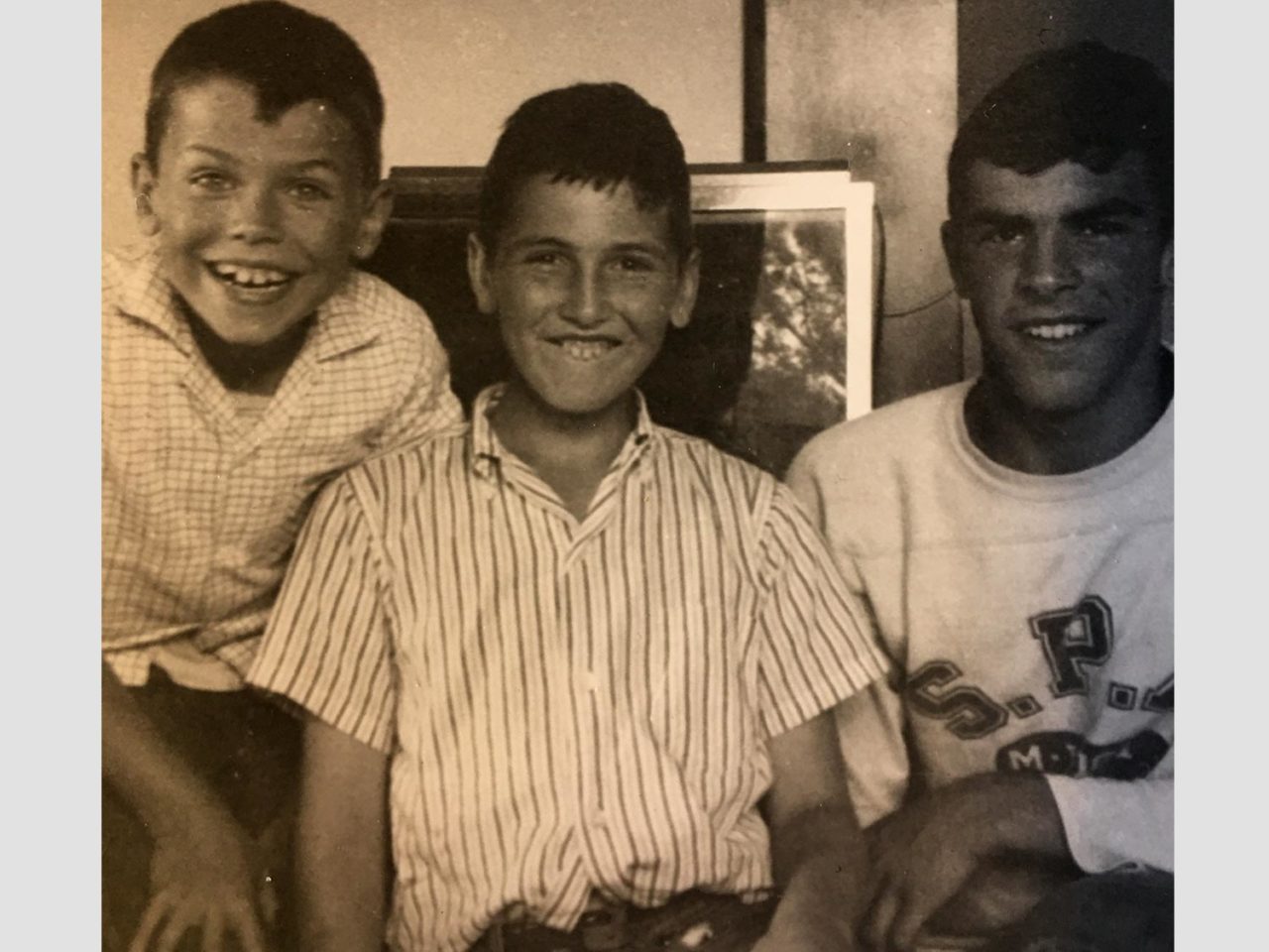 early photo of John Fitzpatrick with two brothers