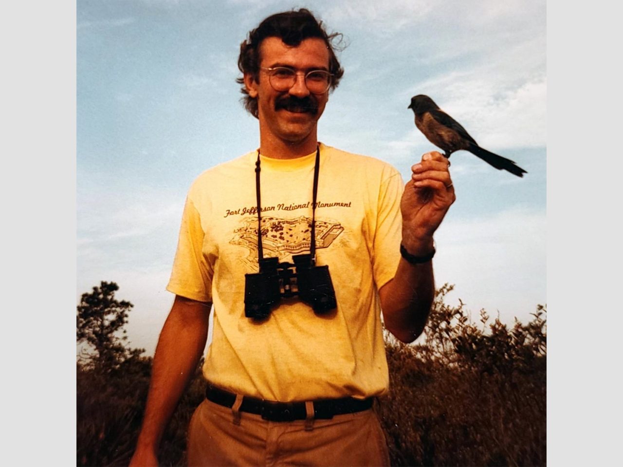 John Fitzpatrick in 1980s, Florida Scrub-Jay perched on his hand
