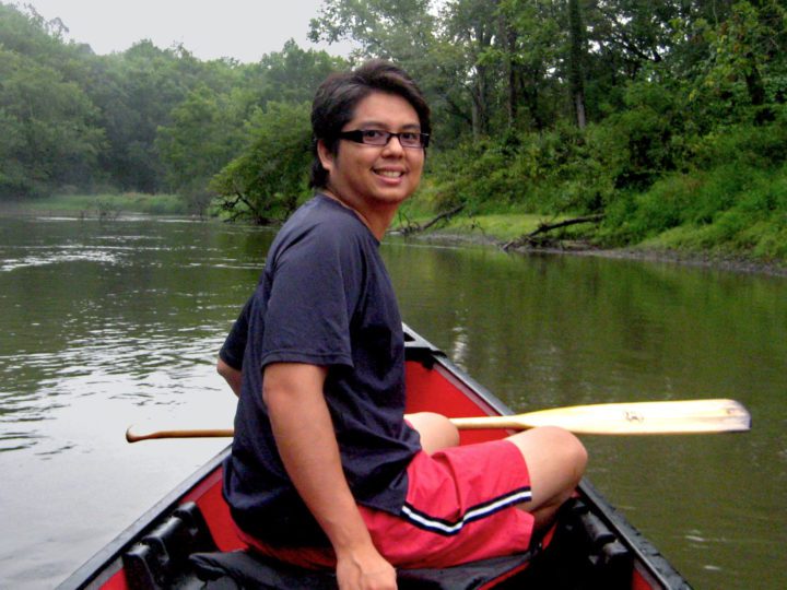 Patrick Chaopricha in a canoe