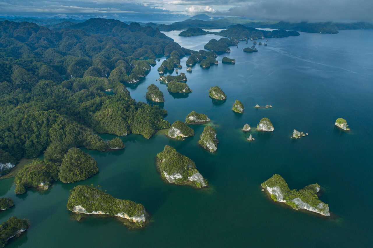 View of islets surrounded by deep blue water