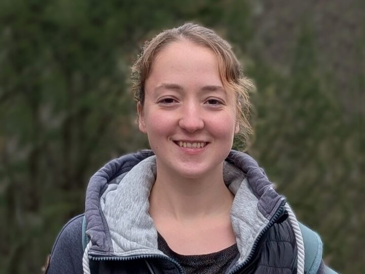 Kerry looking at the camera, smiling.