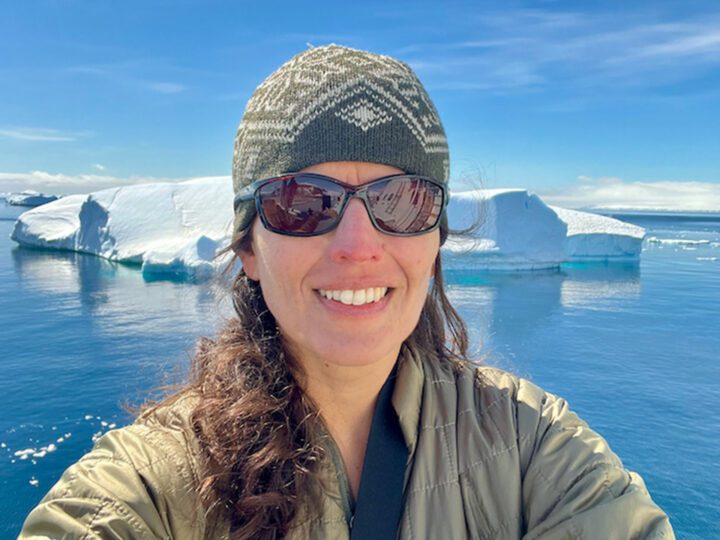 Lyanne smiling at the camera.