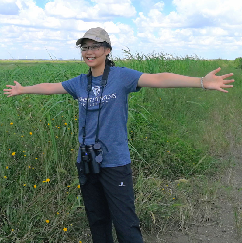 Lezhi Hao birding in field