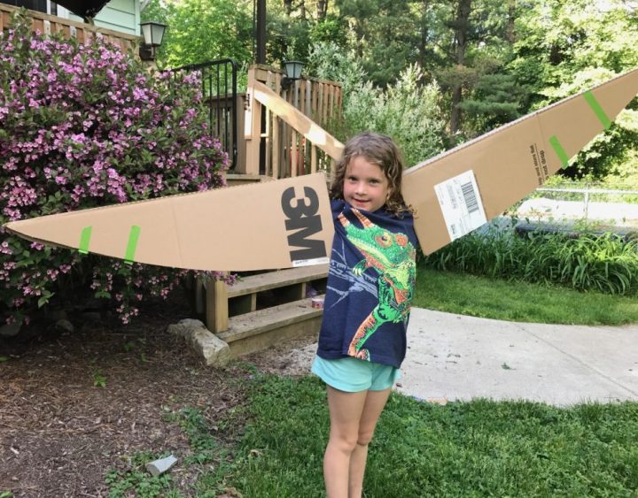 Child with handmade wings