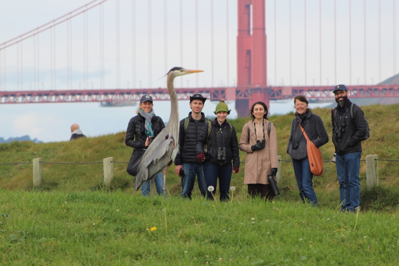 FBC members pose behind a Great Blue Heron in San Francisco.