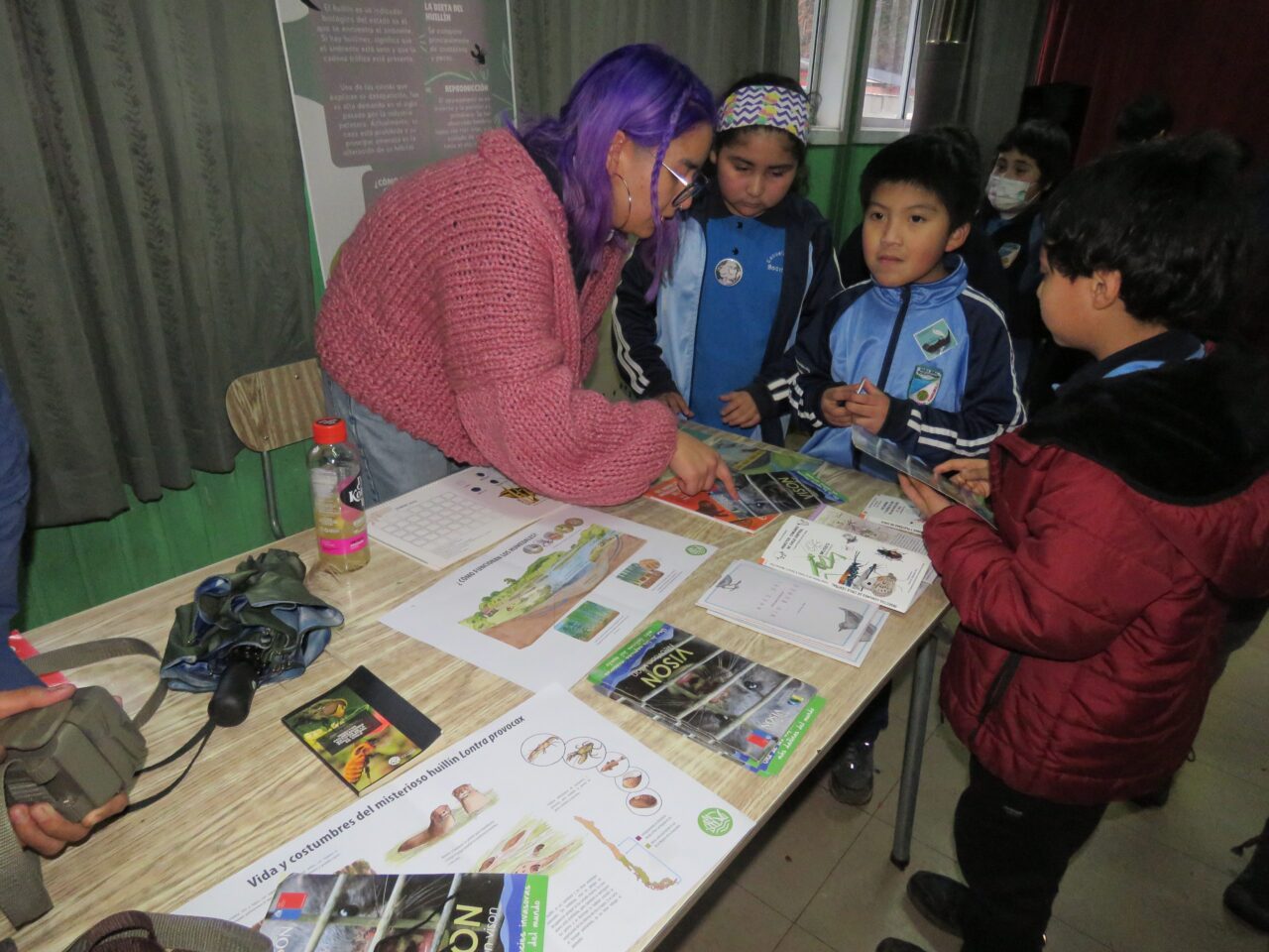 Students receiving instruction on how to use bird guides